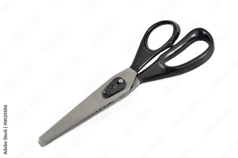 Metal scissors zigzag isolated on white background Metal scissors zigzag isolated on white background