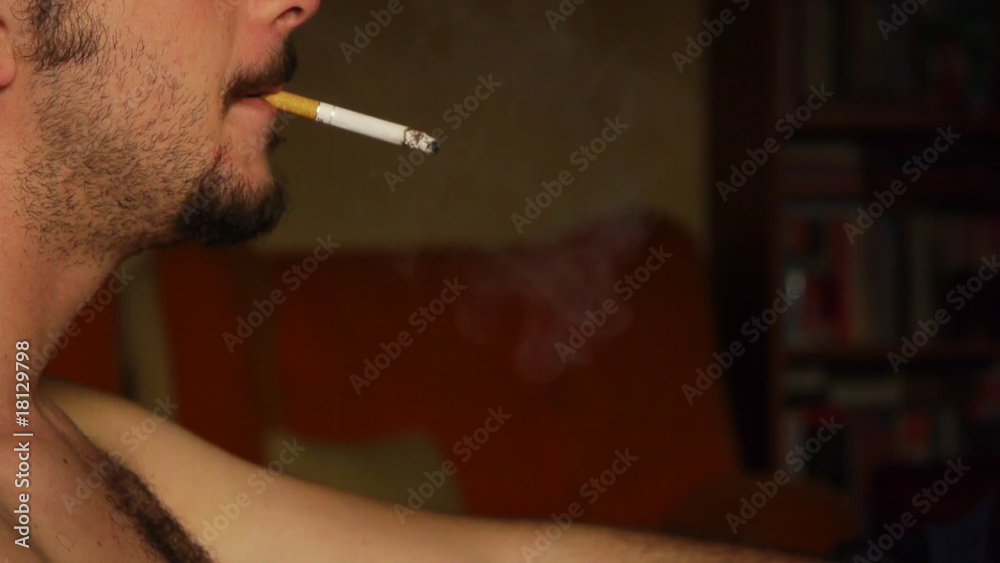 a naked young White man smoke cigarette / profile 2