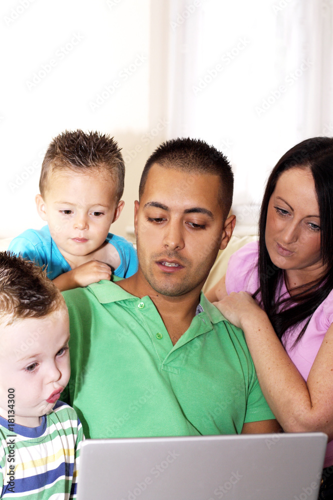 family using computer family using computer