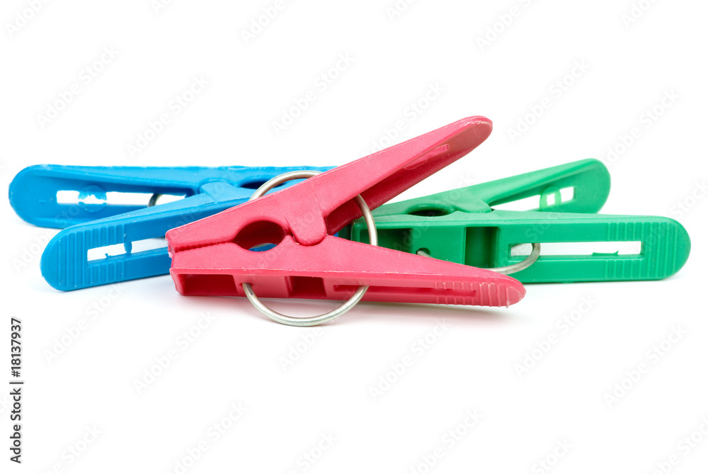 Three cheap plastic clotespins Three cheap plastic clotespins