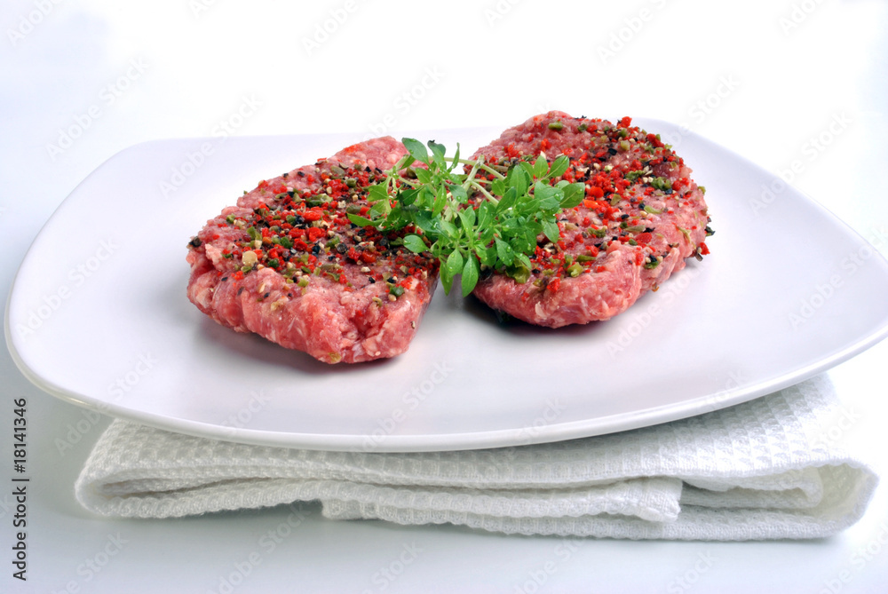 fresh peppered lamb grill steak on a white plate fresh peppered lamb grill steak on a white plate