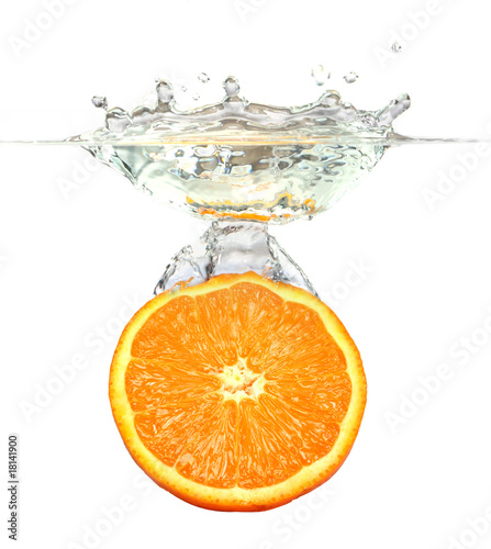 Fototapeta Naklejka Na Ścianę i Meble -  Orange - splashing water