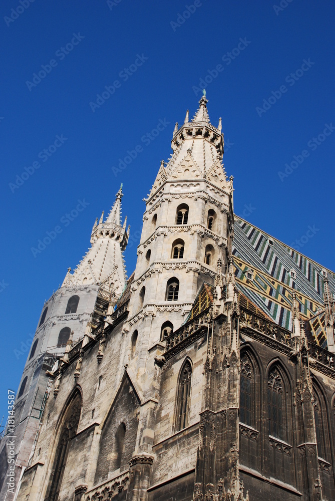 View of St. Stephen's Cathedral (Stephansdom) agains blue sky at Stephansplatz in Vienna, Austria, Europe.	