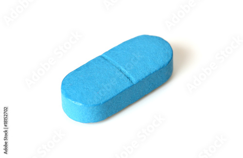Single blue pill isolated on white