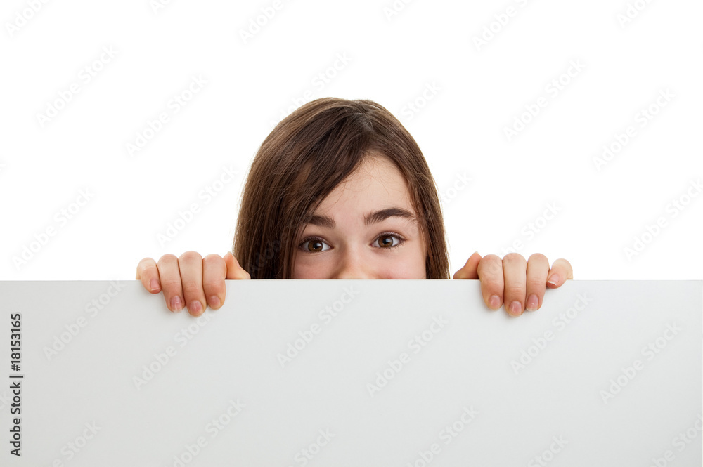 Girl behind empty board isolated on white background Girl behind empty board isolated on white background