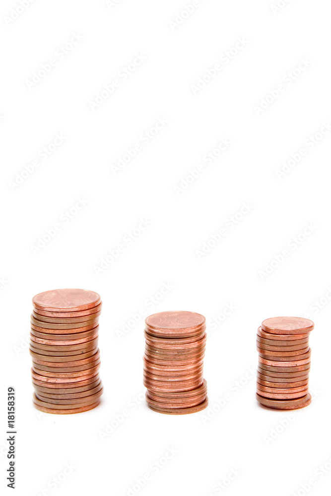 towers of golden coins isolated on white towers of golden coins isolated on white