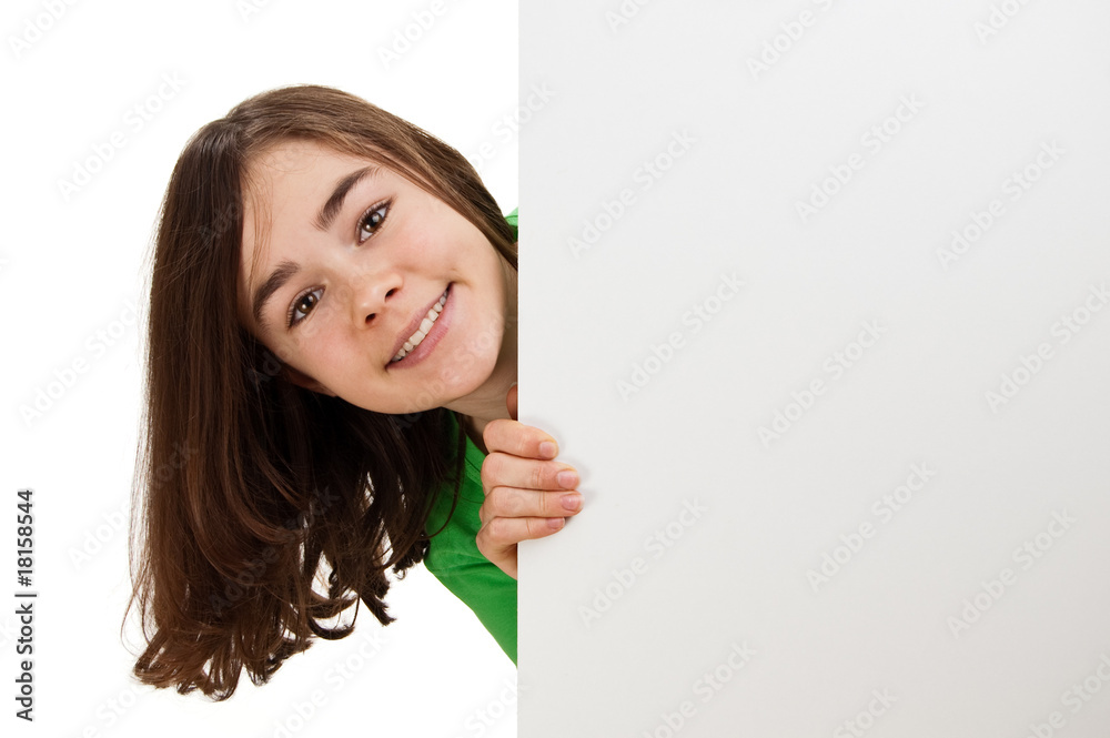 Girl behind empty board isolated on white background Girl behind empty board isolated on white background