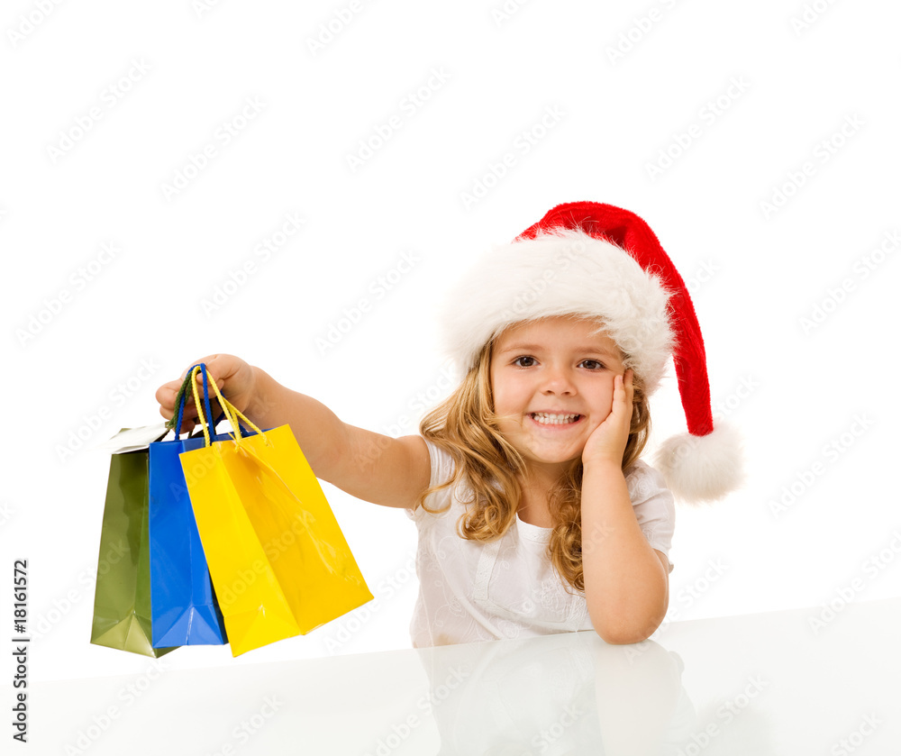 Happy little girl christmas shopping Happy little girl christmas shopping