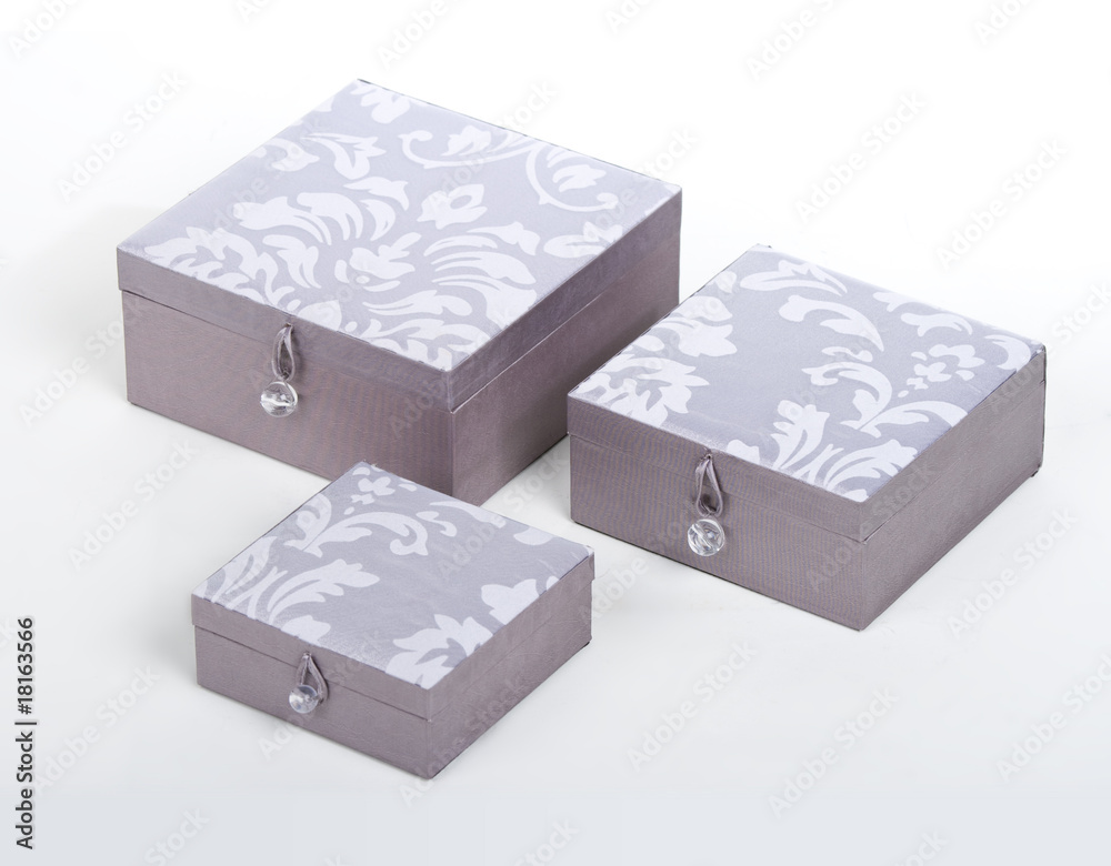 fancy silver wooden boxes over white background fancy silver wooden boxes over white background