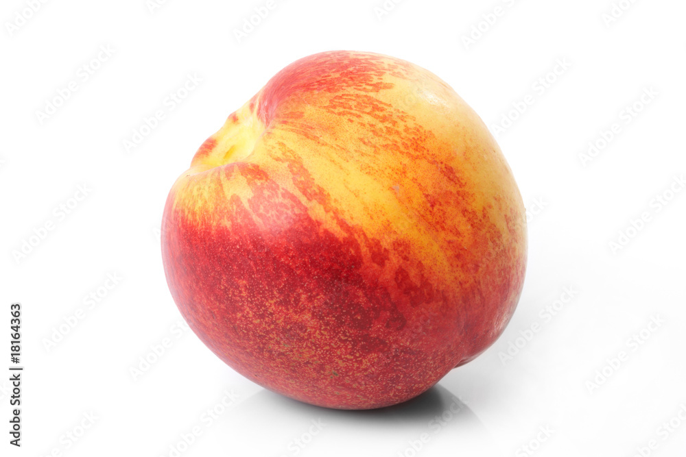 Fresh nectarine isolated on white background.
