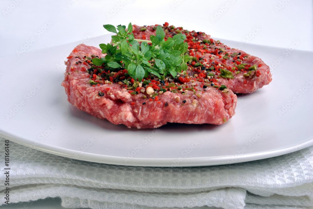 fresh peppered lamb grill steak on a white plate fresh peppered lamb grill steak on a white plate