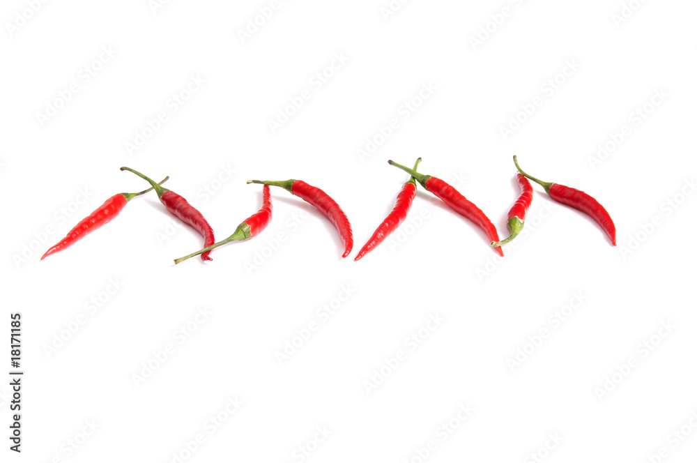 Fun ripe red peppers on a white. Fun ripe red peppers on a white.