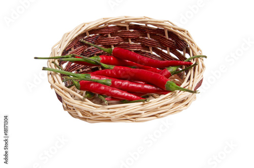 Splendid  wooden basket full of red peppers