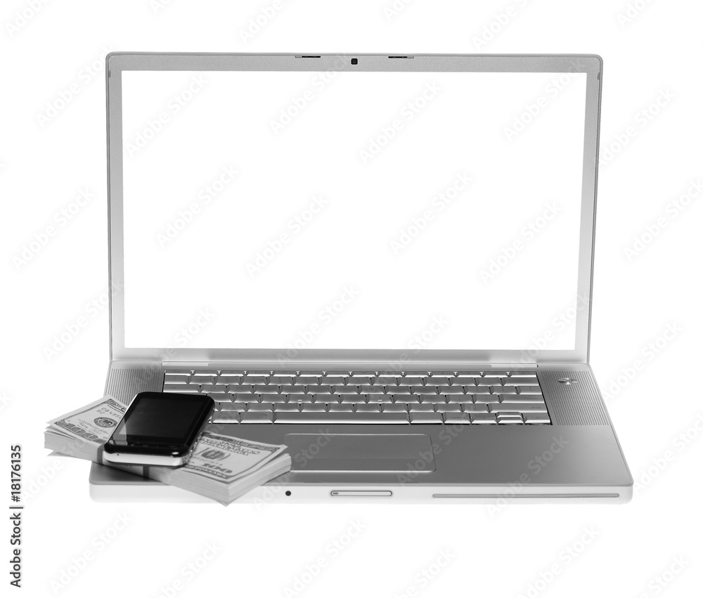 Laptop with cellphone and US money Laptop with cellphone and US money