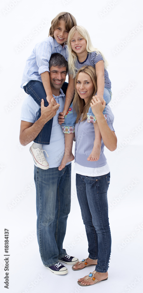 Family giving children piggyback ride Family giving children piggyback ride