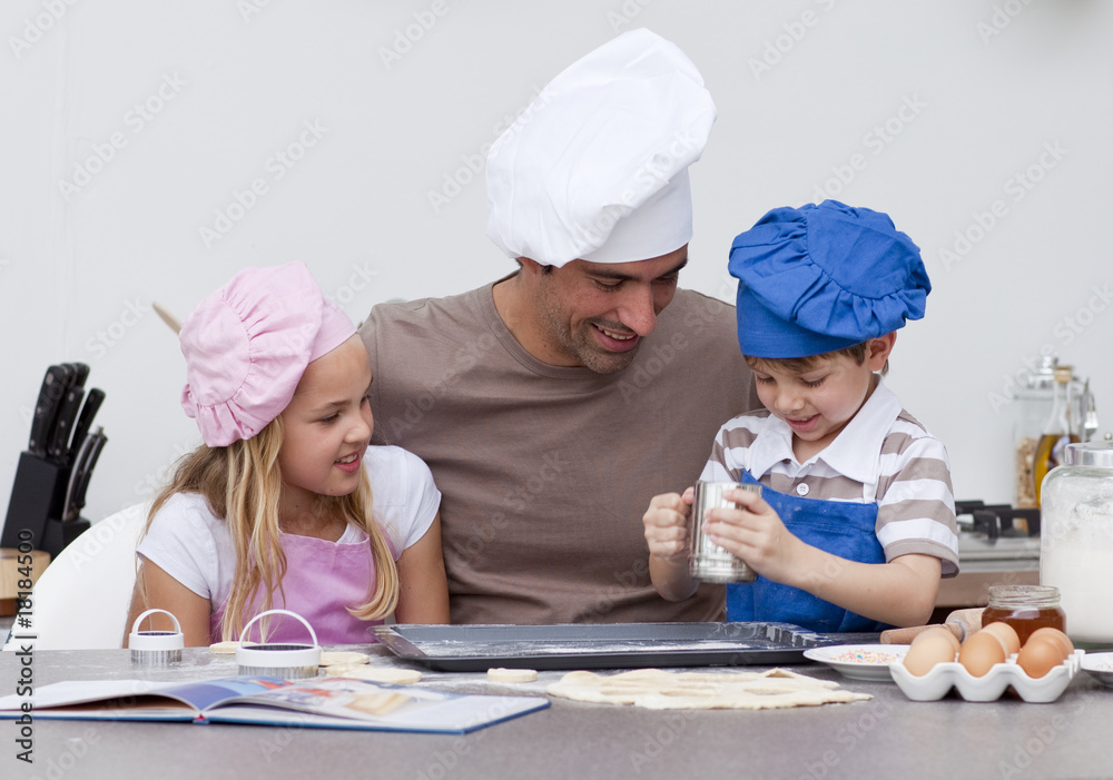 Father and children baking in the kitchen Father and children baking in the kitchen