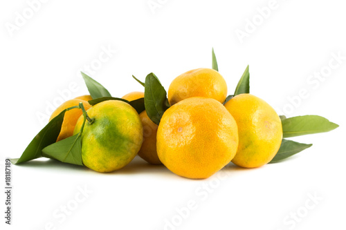 Pile of fresh tangerines isolated white background