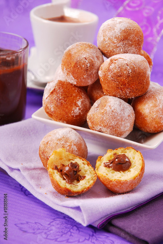 small round donuts with chocolate filling