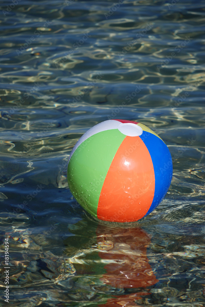 Beach ball in the water