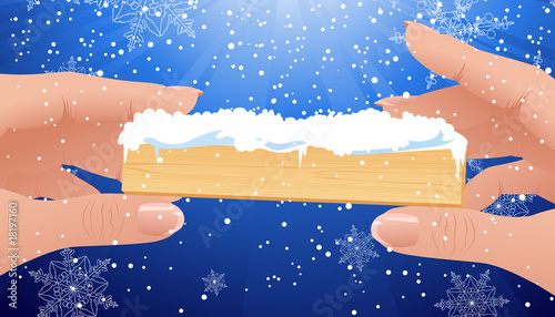 Human fingers holding Christmas frame