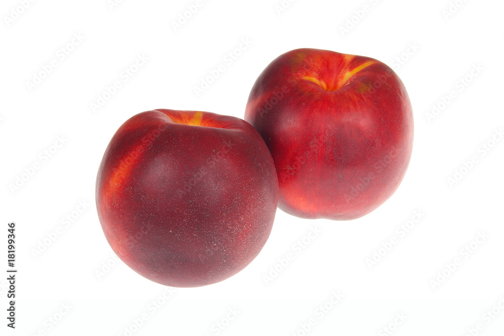 pair of ripe nectarines pair of ripe nectarines