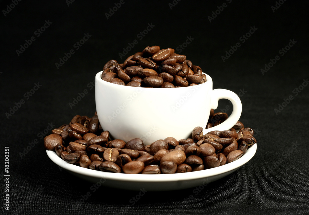 coffee time, a cup of beans on a black background coffee time, a cup of beans on a black background