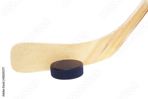 ice hockey stick and puck isolated on white