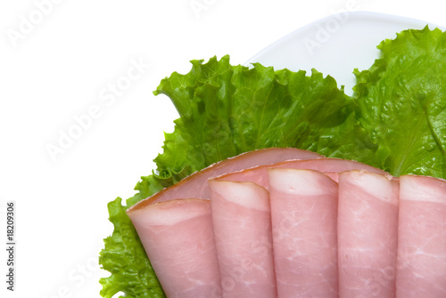 slices of pork and fresh greens