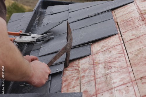 roofer made a roof with slates