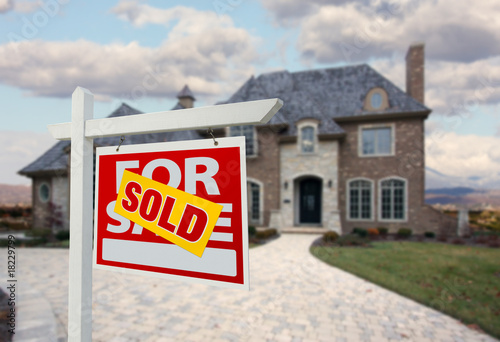 Sold Home For Sale Sign in Front of New House