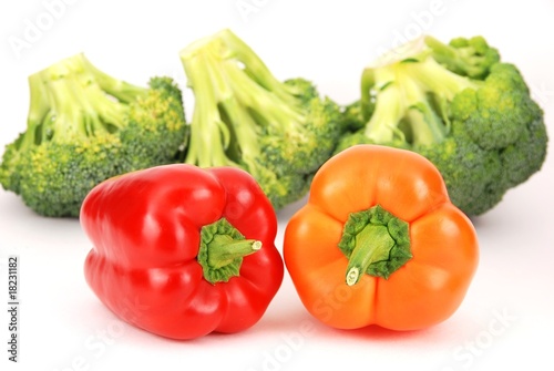 Isolated broccoli and colorful pepper