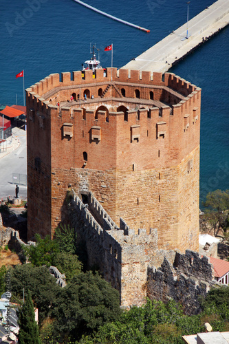 Port Alanya and red brick tower photo