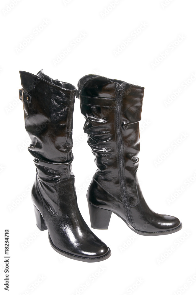 Modern winter boots for women on a white.
