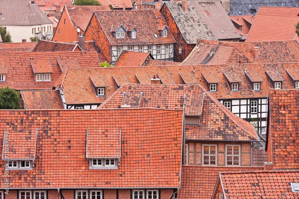Facing at the red roofs of the medieval city Quedlinburg in Germ