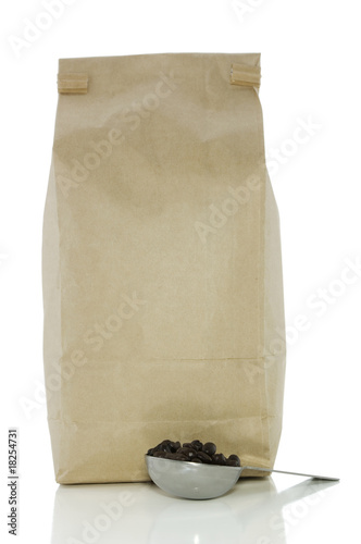 Bag of coffee and scoop on white with clipping path