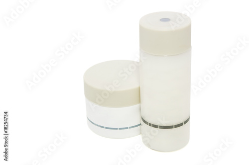 Cosmetic/lotion bottles on white with clipping path