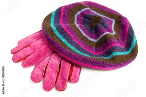 Suede gloves and woolen beret isolated on white
