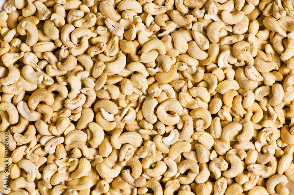 Cashew nuts arranged at the background Cashew nuts arranged at the background