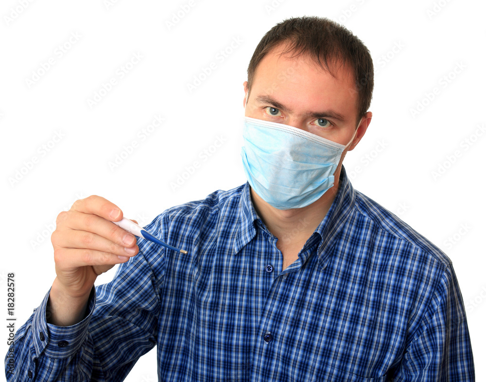 Man in a medical mask with a thermometer. Man in a medical mask with a thermometer.