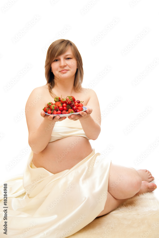 pregnant wooman sit on white isolated background pregnant wooman sit on white isolated background