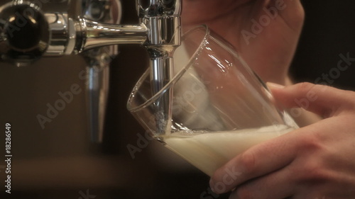 Pouring pint of beer