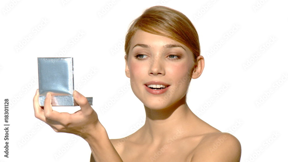 Portrait of beautiful and sexy woman is doing makeup Portrait of beautiful and sexy woman is doing makeup