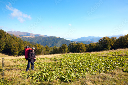 Photographer and autumn mountains