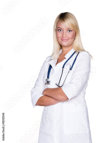 Young female doctor smiling isolated on white