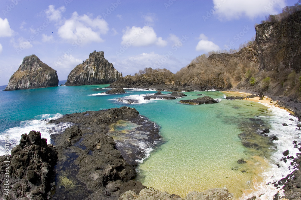 Pig bay view with two brothers islands in fernando de noronha