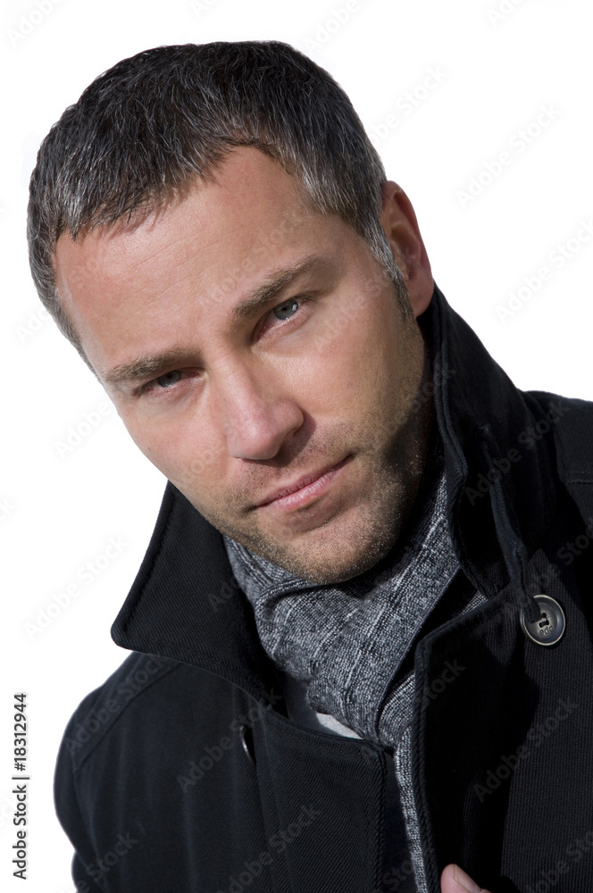 Fototapeta premium Junger Mann mit Jacke und Schal