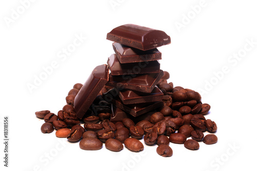 Coffee beans and chocolate pieces isolated on white