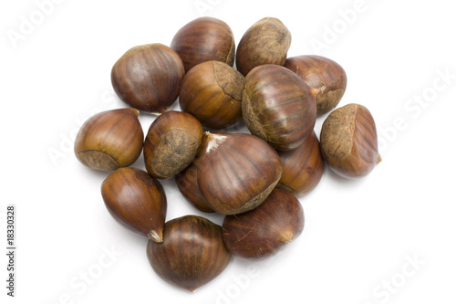 isolated brown chestnuts with a white background