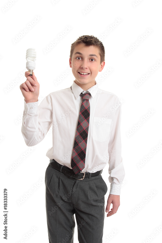 School boy holding a light bulb School boy holding a light bulb