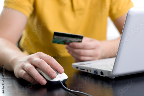 Online shopping concept, paying with a credit card